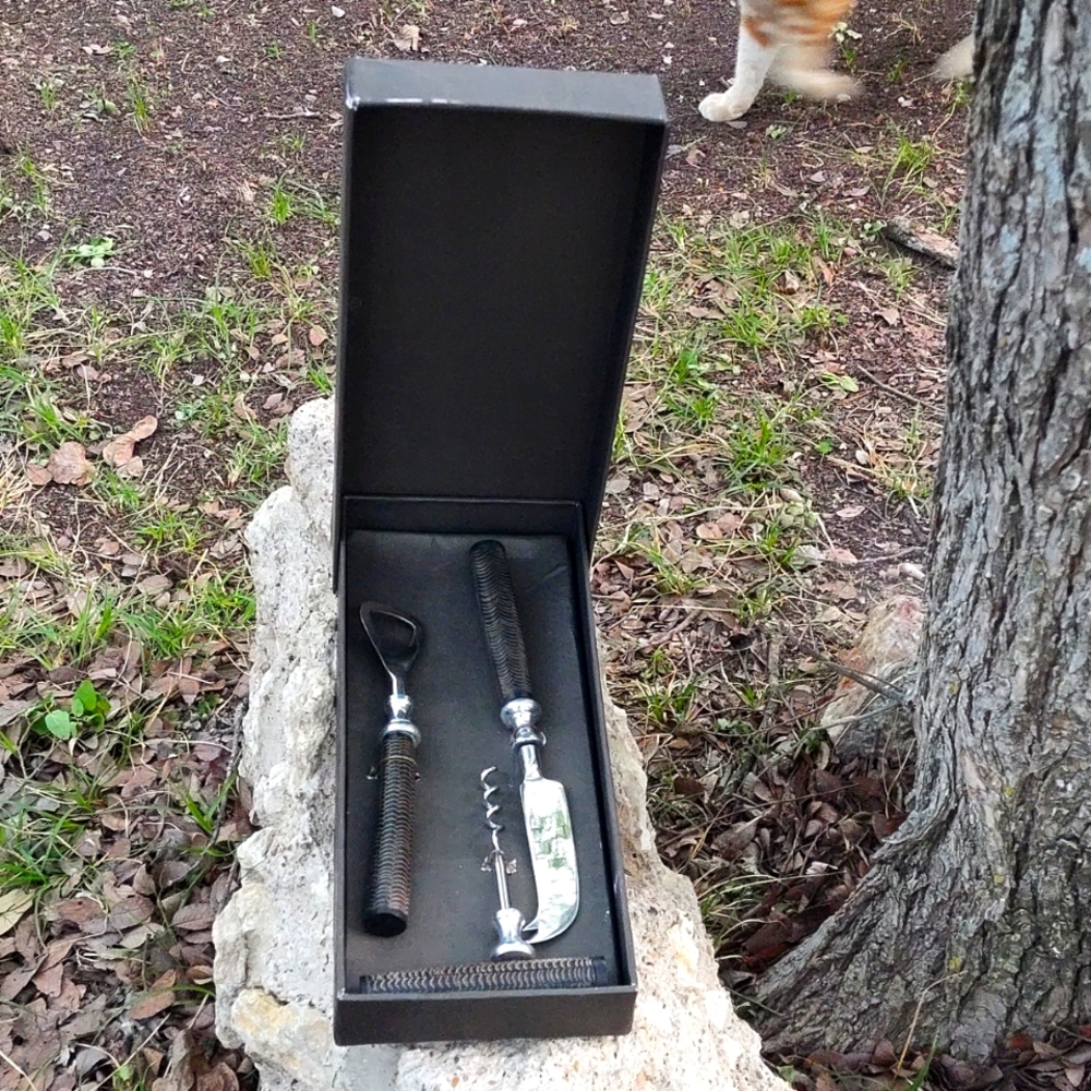 Wine, Bottle opener... Cheese knife.